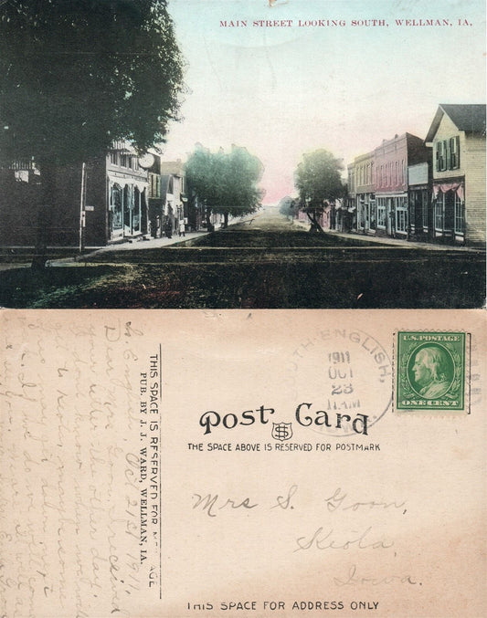 WELLMAN IA MAIN STREET 1911 ANTIQUE POSTCARD