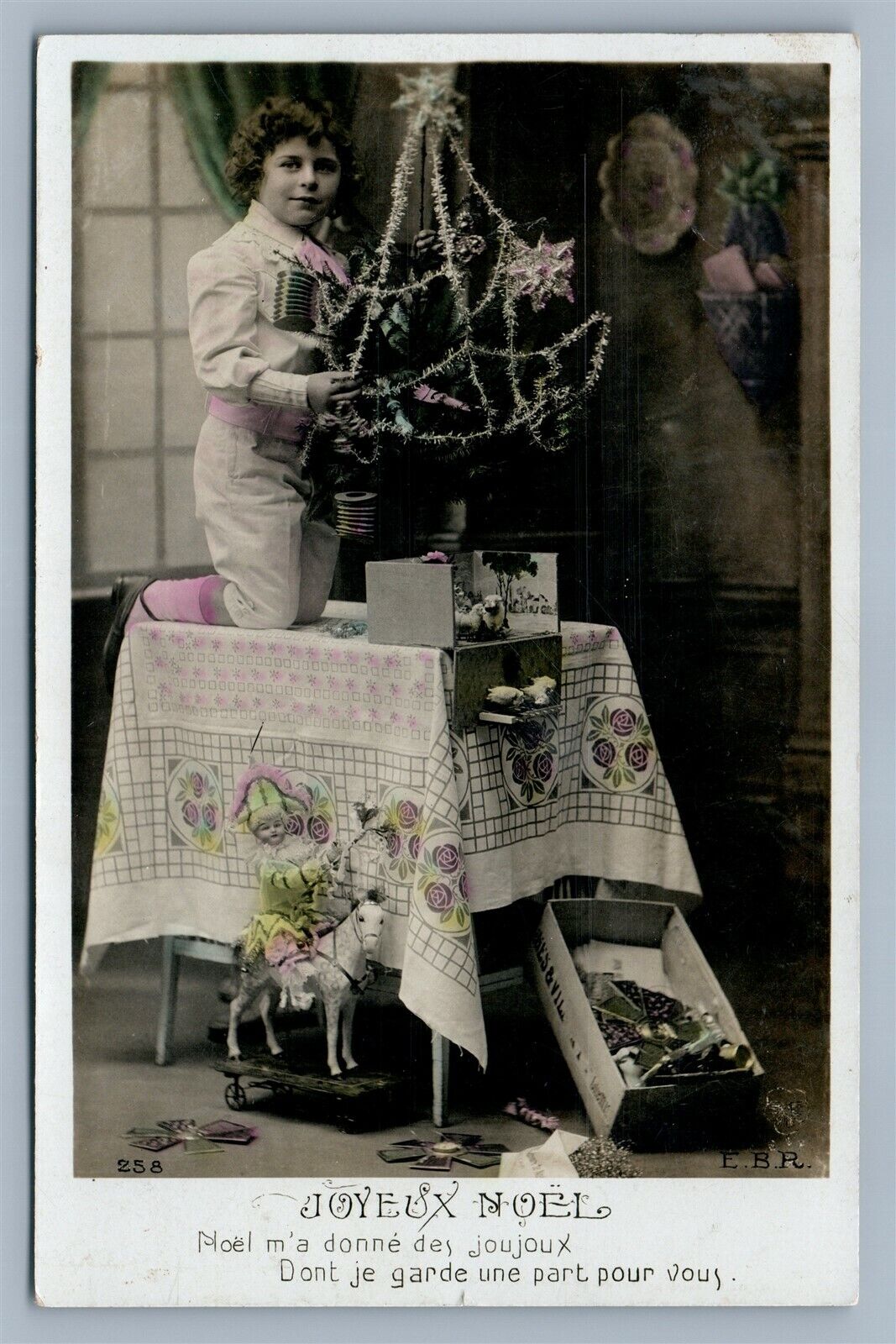 BOY DECORATING CHRISTMAS TREE w/ TOY HORSE ANTIQUE REAL PHOTO POSTCARD RPPC