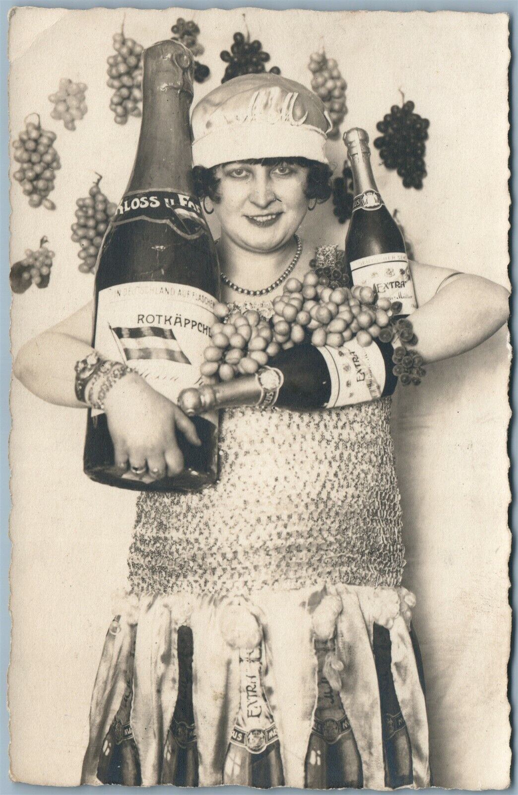 ANTIQUE REAL PHOTO PHOTOMONTAGE POSTCARD RPPC GIRL w/ CHAMPAIGNE BOTTLES