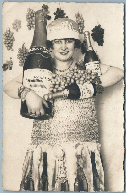 ANTIQUE REAL PHOTO PHOTOMONTAGE POSTCARD RPPC GIRL w/ CHAMPAIGNE BOTTLES
