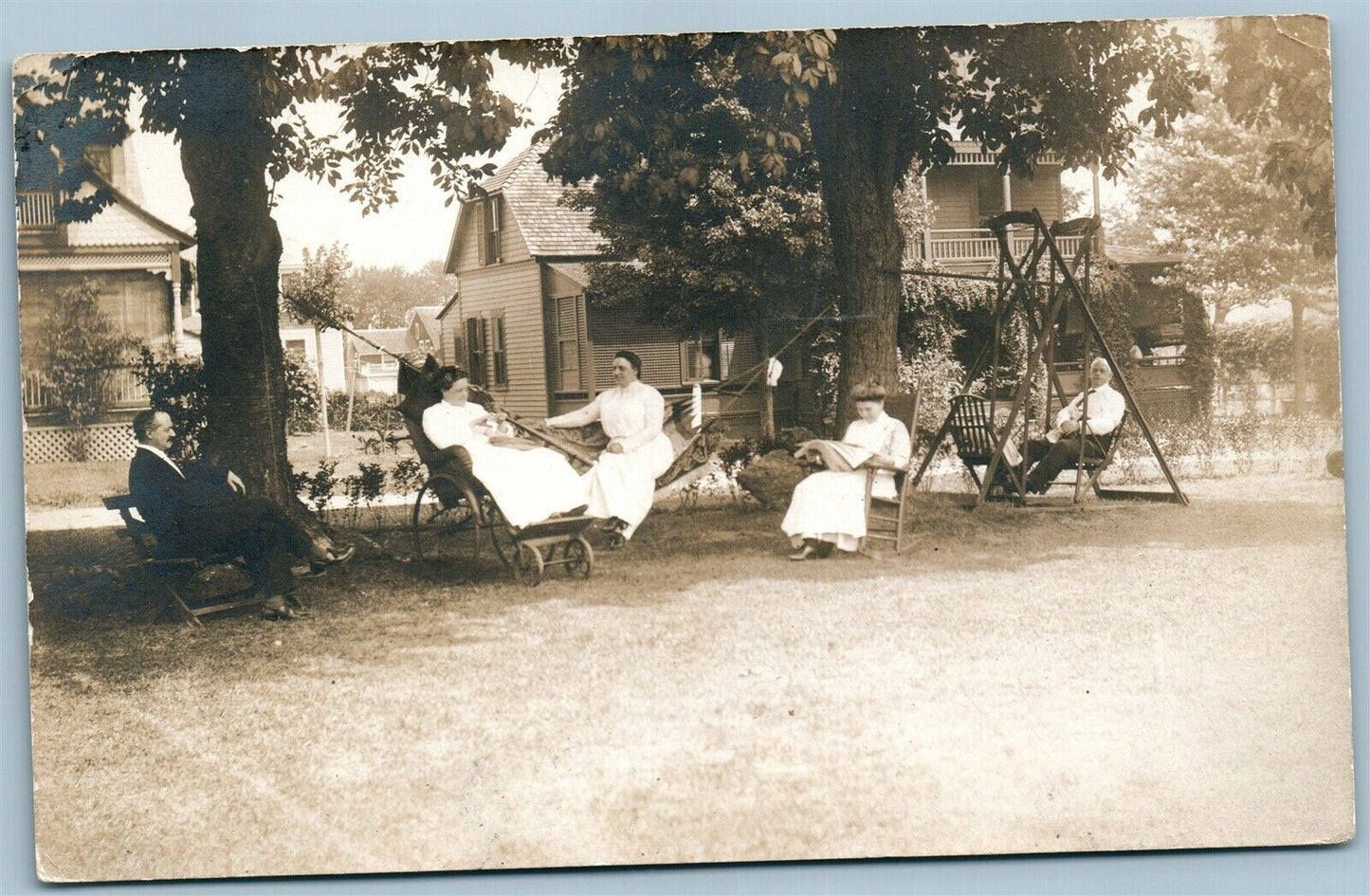 RELAXING ON THE BACK YARD ANTIQUE REAL PHOTO POSTCARD RPPC