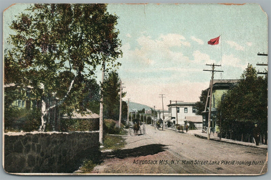 ADIRONDACK MTS. NY MAIN STREET LAKE PLACID ANTIQUE POSTCARD