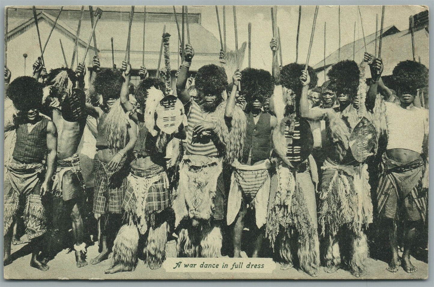 AFRICA WAR DANCE IN FULL DRESS ANTIQUE POSTCARD