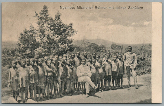 CAMEROON NGAMBE MISSIONER w/ NATIVES ANTIQUE POSTCARD