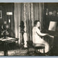 PIANO PLAYER in HOME INTERIOR ANTIQUE REAL PHOTO POSTCARD RPPC