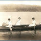 WOMEN CANOEING ANTIQUE REAL PHOTO POSTCARD RPPC