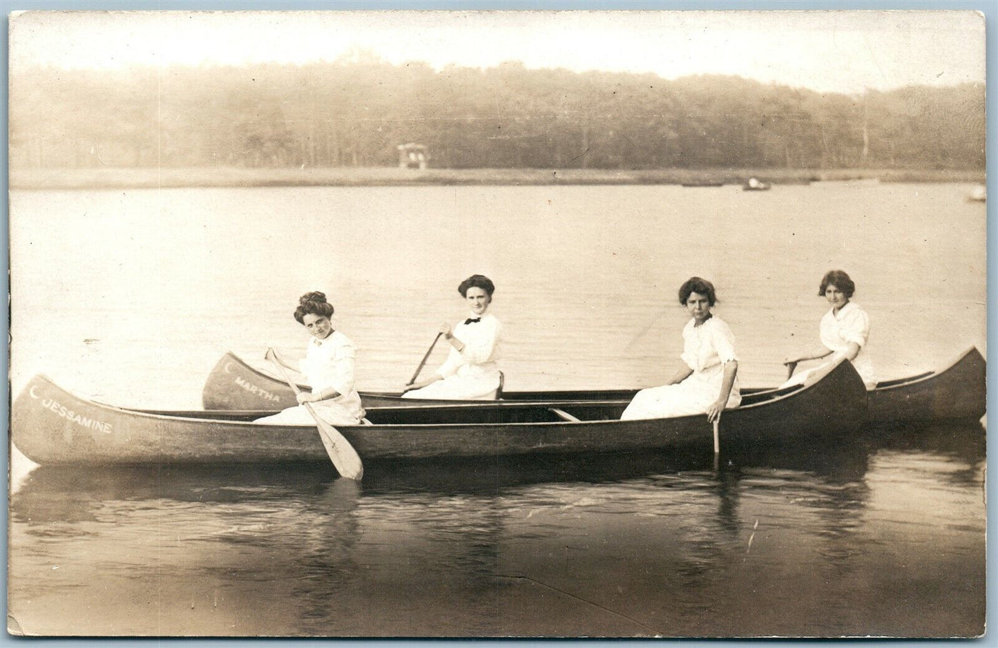 WOMEN CANOEING ANTIQUE REAL PHOTO POSTCARD RPPC