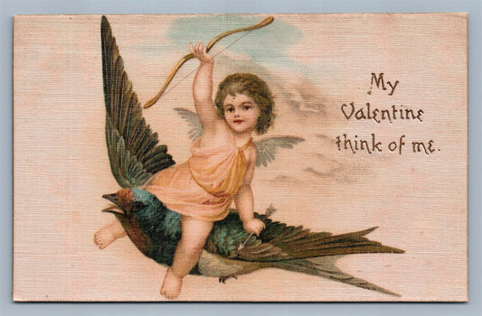 VALENTINE ANTIQUE EMBOSSED POSTCARD on SILK CUPID FLYING on BIRD