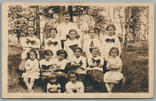 GIRLS SCHOOL GROUP w/ TEACHER ANTIQUE REAL PHOTO POSTCARD RPPC