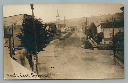SYKESVILLE PA MAIN STREET EAST ANTIQUE REAL PHOTO POSTCARD RPPC