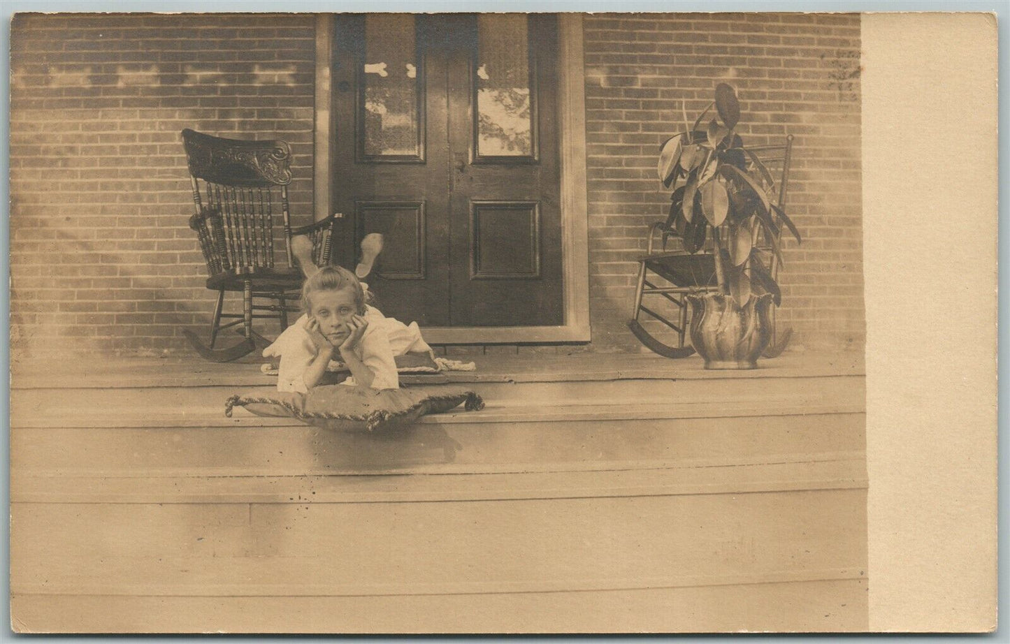 GIRL ON PORCH 1907 ANTIQUE REAL PHOTO POSTCARD RPPC