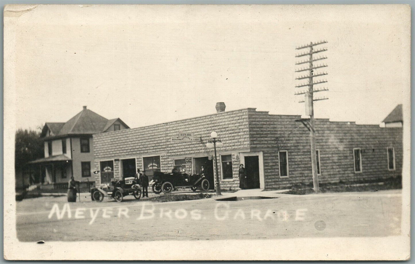 IRON MT. MI MEYER BROS. AUTOMOBILE CAR GARAGE ANTIQUE REAL PHOTO POSTCARD RPPC