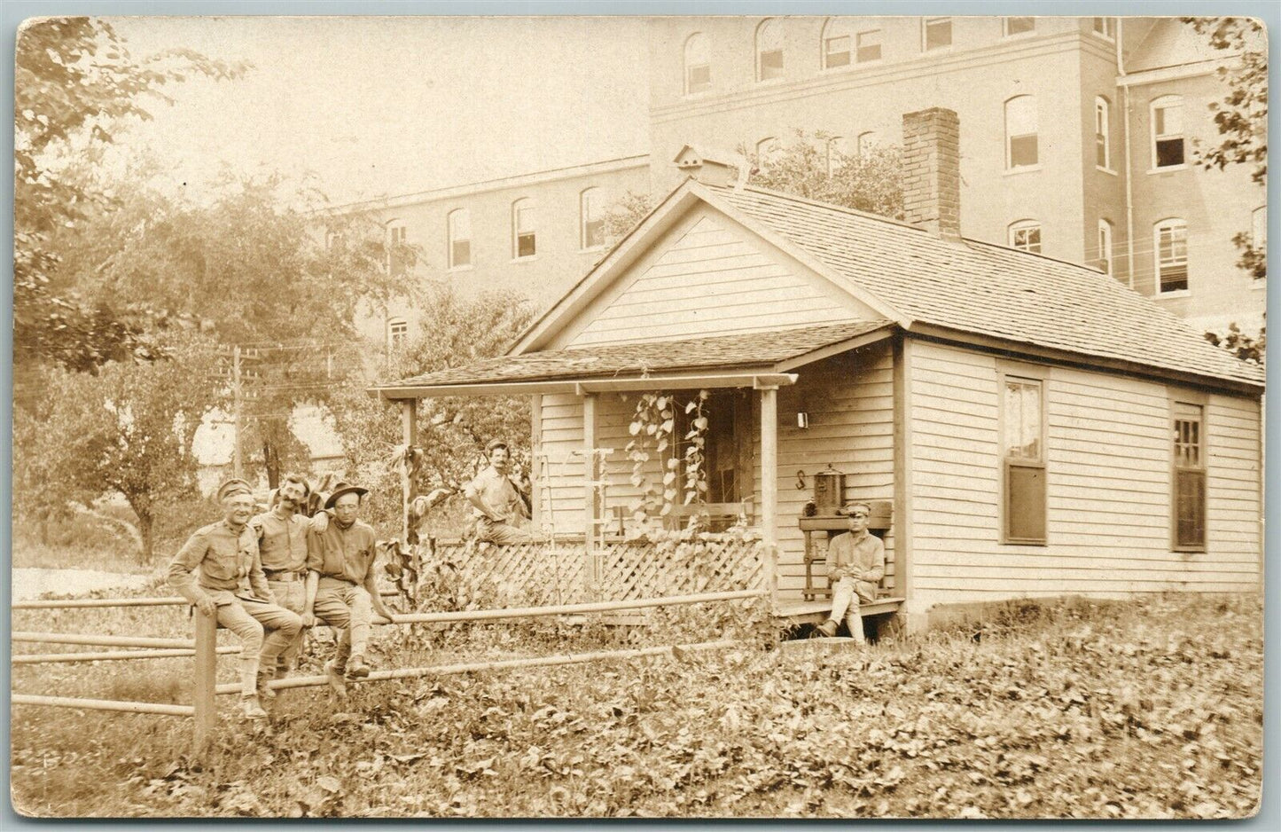 SOLDIERS AT HOME ENTRANCE ANTIQUE REAL PHOTO POSTCARD RPPC