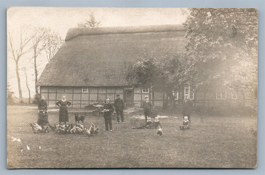 FAMILY w/ CHICKENS FARMING ANTIQUE REAL PHOTO POSTCARD RPPC