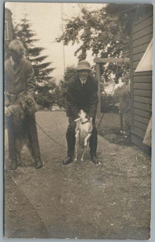 2 MEN POSING with DOGS ANTIQUE REAL PHOTO POSTCARD RPPC