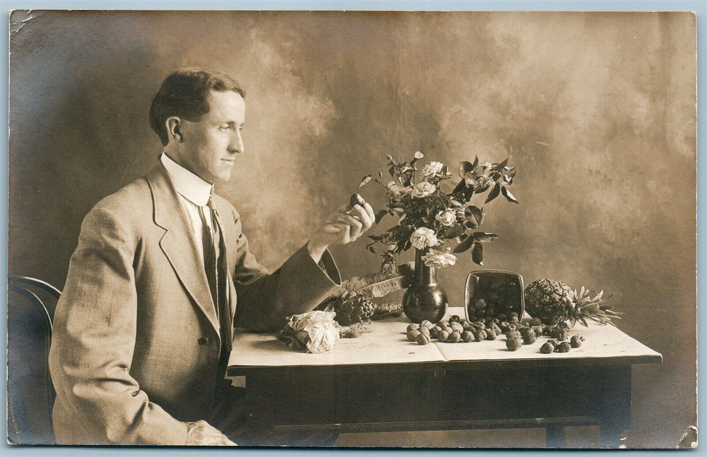 ROMANTIC MAN w/ FLOWERS AND WALNUTS ANTIQUE REAL PHOTO POSTCARD RPPC