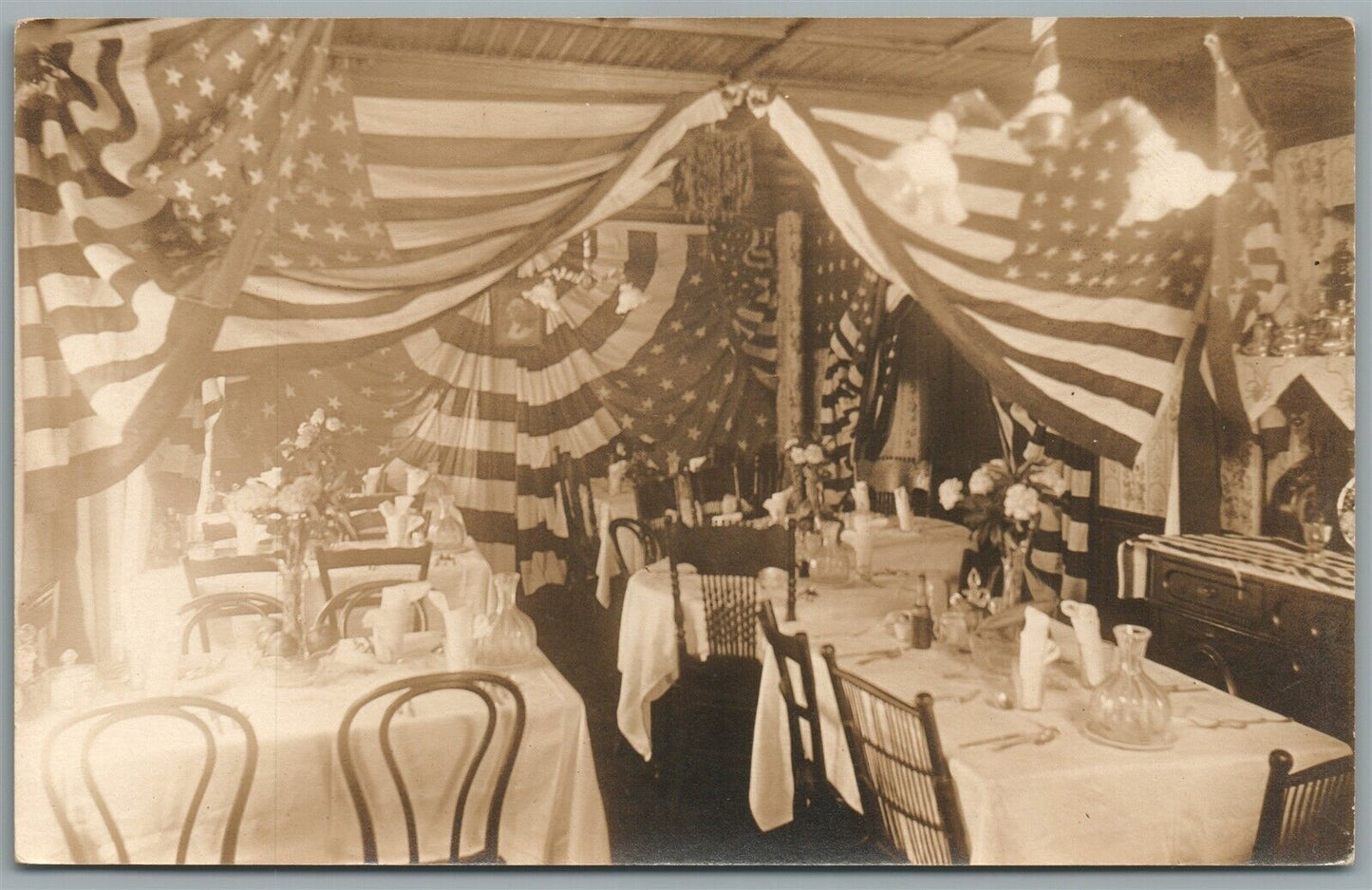 RESTAURANT DECORATED w/AMERICAN FLAGS PATRIOTIC ANTIQUE REAL PHOTO POSTCARD RPPC