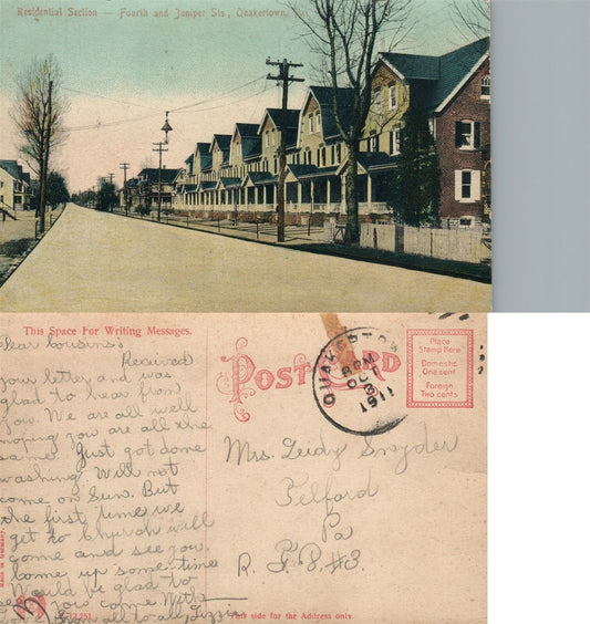 QUAKERTOWN BUCKS COUNTY PA FRONT & JUNIPER STREET 1911 ANTIQUE POSTCARD