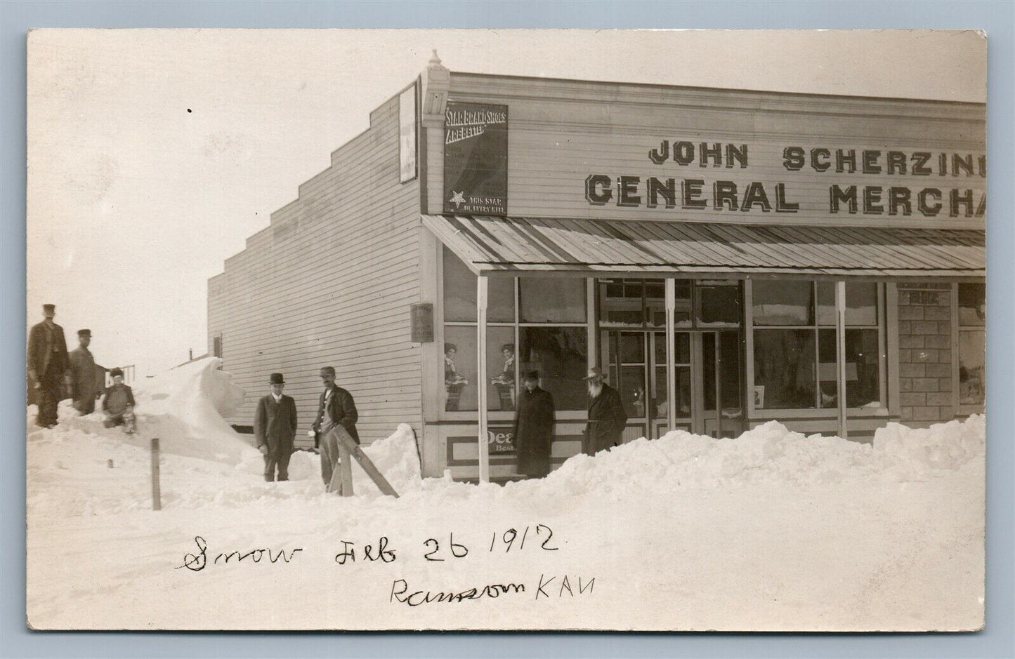 RANSOM KS 1912 SNOW STORM ANTIQUE REAL PHOTO POSTCARD RPPC JOHN SCHERZING STORE