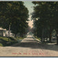 DEXTER ME MAIN STREET LOOKING NORTH ANTIQUE POSTCARD