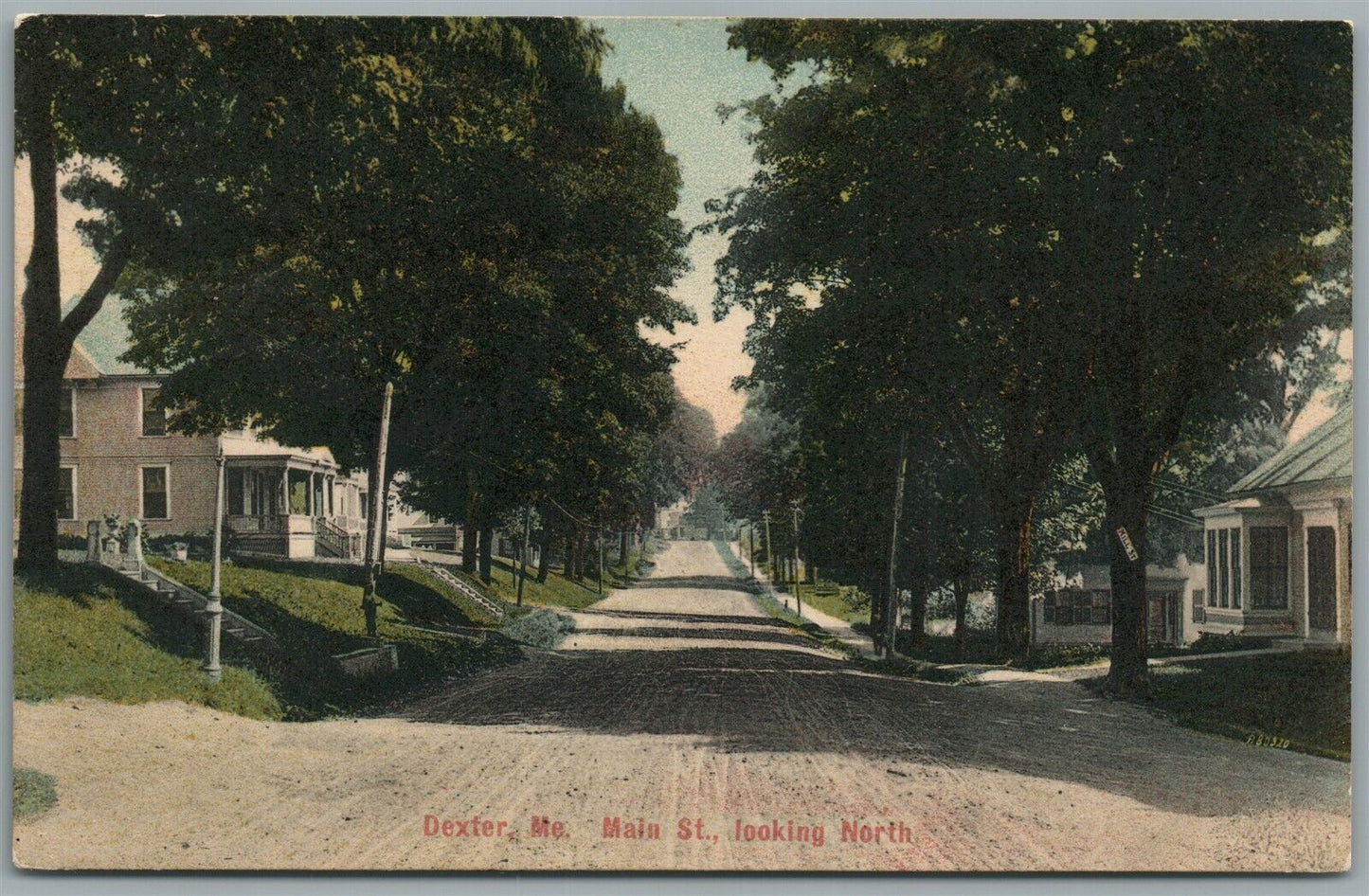 DEXTER ME MAIN STREET LOOKING NORTH ANTIQUE POSTCARD