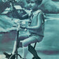 GIRL w/ FLOWERS ON BICYCLE 1934 VINTAGE POSTCARD