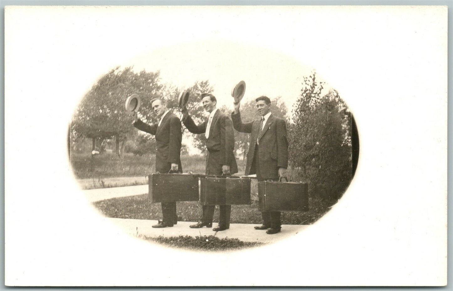 WELL DRESSED TRAVELERS ANTIQUE REAL PHOTO POSTCARD RPPC