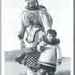 ESKIMO MOTHER & CHILD WEARING DUFFEL PARKAS & SEALSKIN BOOTS VINTAGE POSTCARD