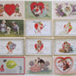 LOT of 12 VALENTINE ANTIQUE EMBOSSED POSTCARDS w/ CUPIDS DOG COUPLES