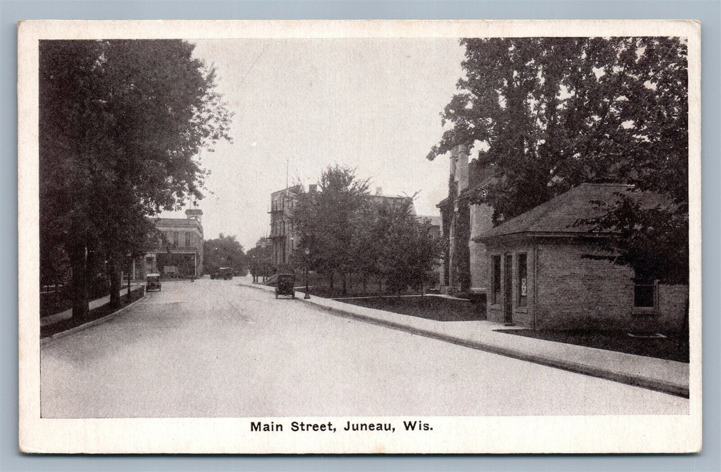 JUNEAU WI MAIN STREET ANTIQUE POSTCARD