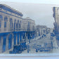 RPPC VINTAGE PHOTO POSTCARD Matamoros Tamaulipas MEXICO STREET OLD CARS & SIGNS