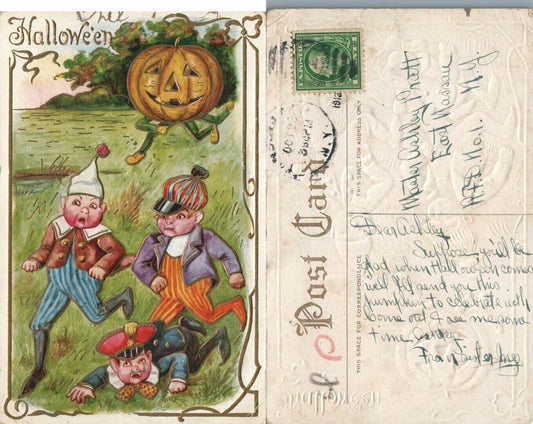 ANTIQUE EMBOSSED HALLOWEEN POSTCARD - JACK-O-LANTERN & 3 SCARED BOYS