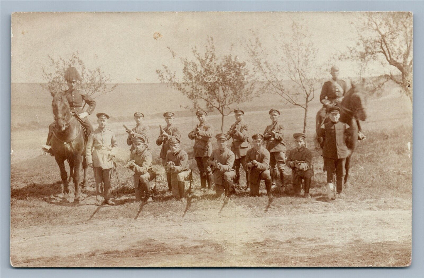 WWI SOLDIERS w/ RIFLES OFFICER on HORSE ANTIQUE REAL PHOTO POSTCARD RPPC