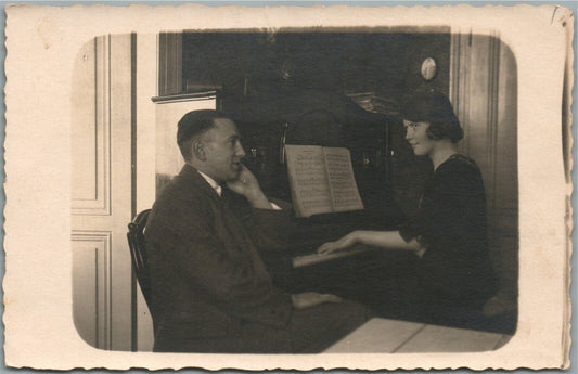 PIANO PLAYER ANTIQUE REAL PHOTO POSTCARD RPPC
