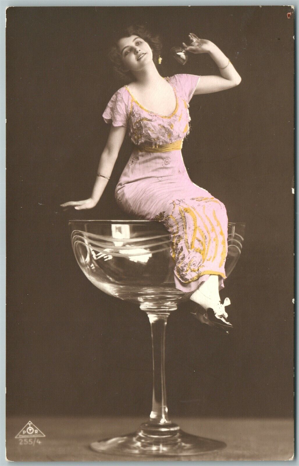 LADY on GLASS RIM DRINKING PHOTOMONTAGE ANTIQUE real photo POSTCARD RPPC