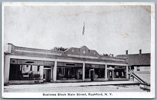 RUSHFORD NY BUSINESS BLOCK MAIN STREET ANTIQUE POSTCARD
