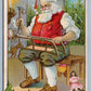 SANTA FIXING SNOW SLEDS CHRISTMAS EMBOSSED ANTIQUE POSTCARD