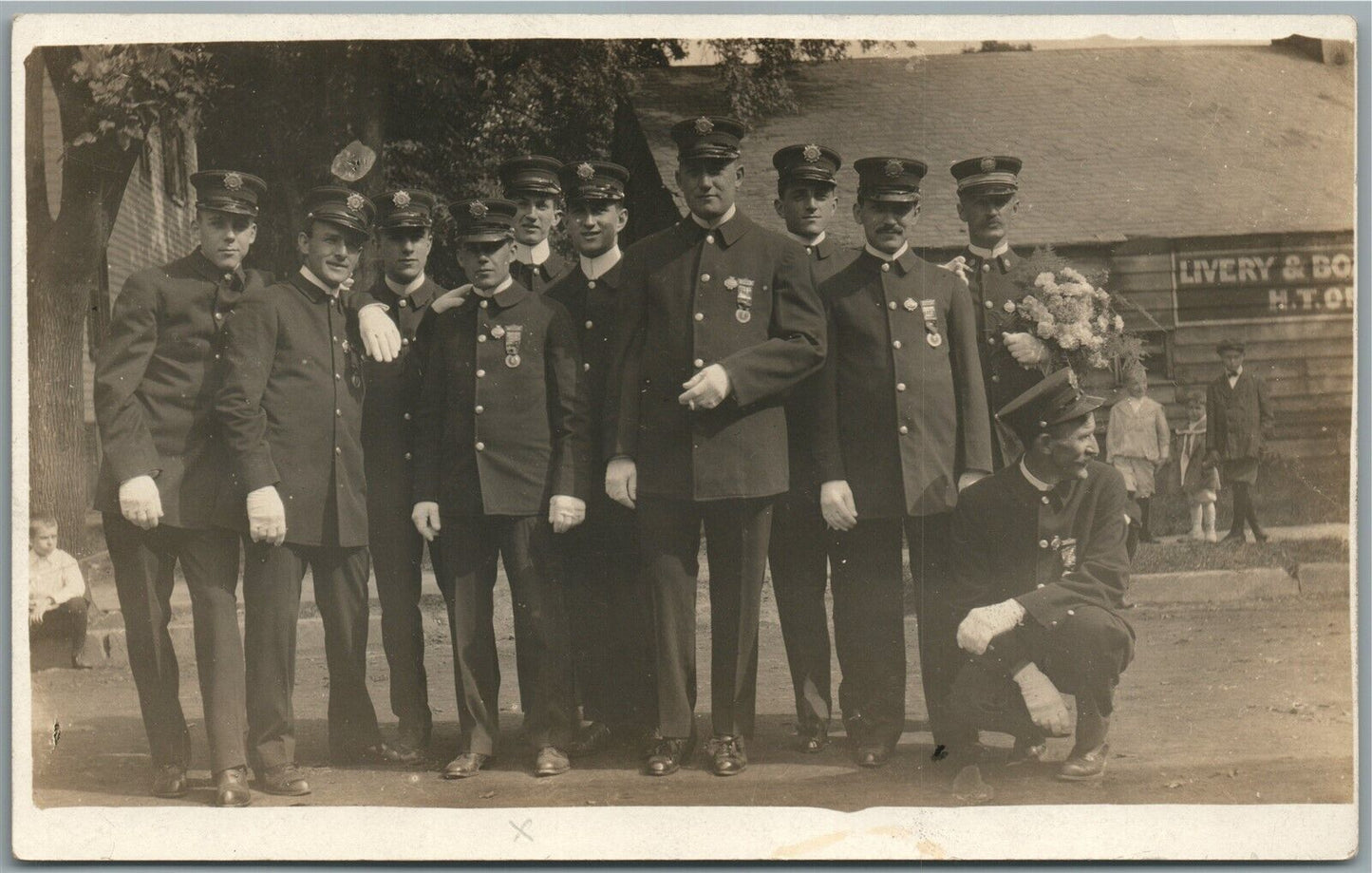 MEN IN UNIFORM FIRE or POLICE DEPT. ANTIQUE REAL PHOTO POSTCARD RPPC