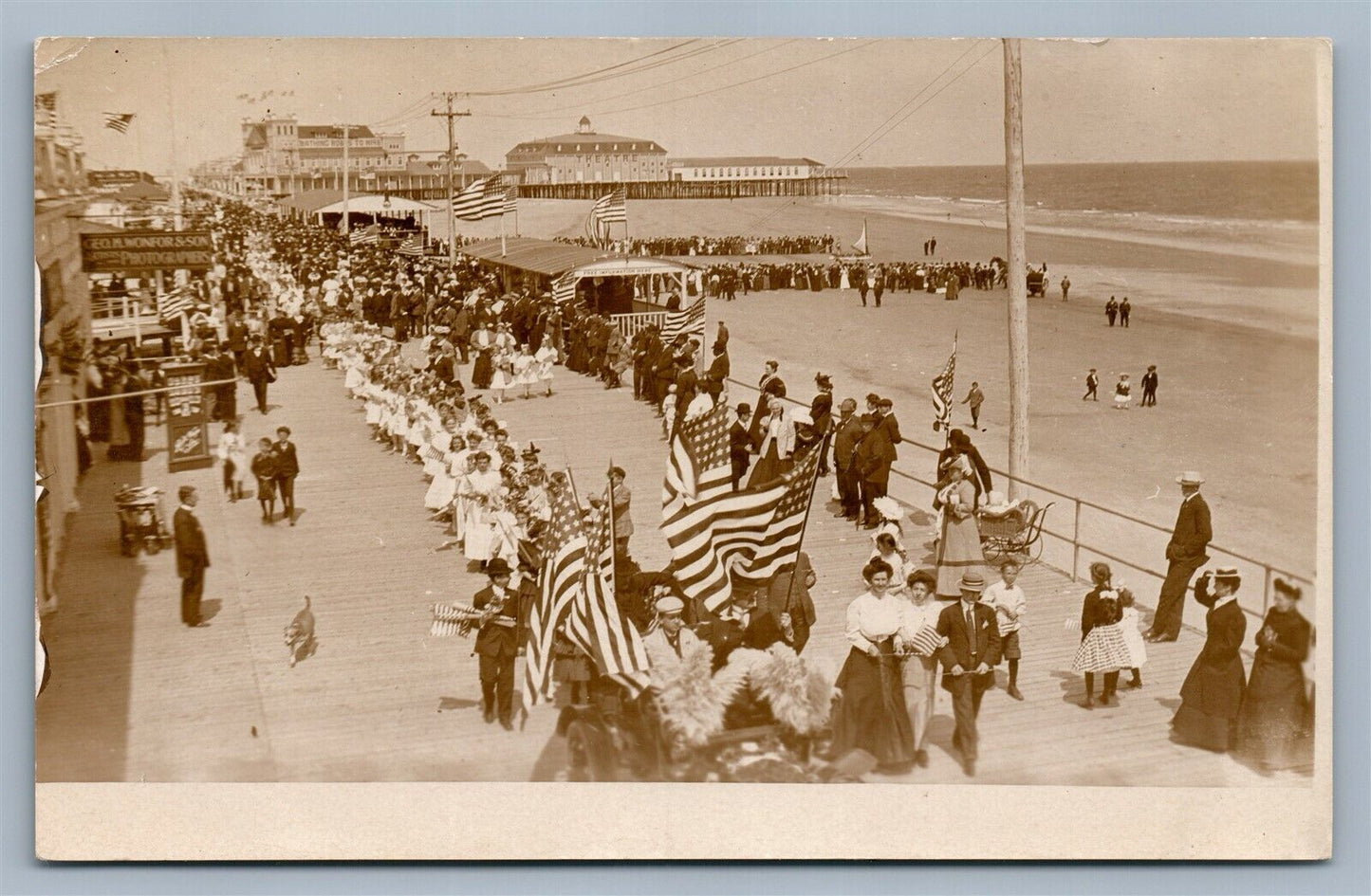 ATLANTIC CITY NJ BOARDWALK PARADE ANTIQUE REAL PHOTO POSTCARD RPPC US FLAGS