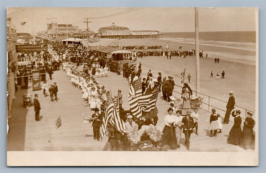 ATLANTIC CITY NJ BOARDWALK PARADE ANTIQUE REAL PHOTO POSTCARD RPPC US FLAGS