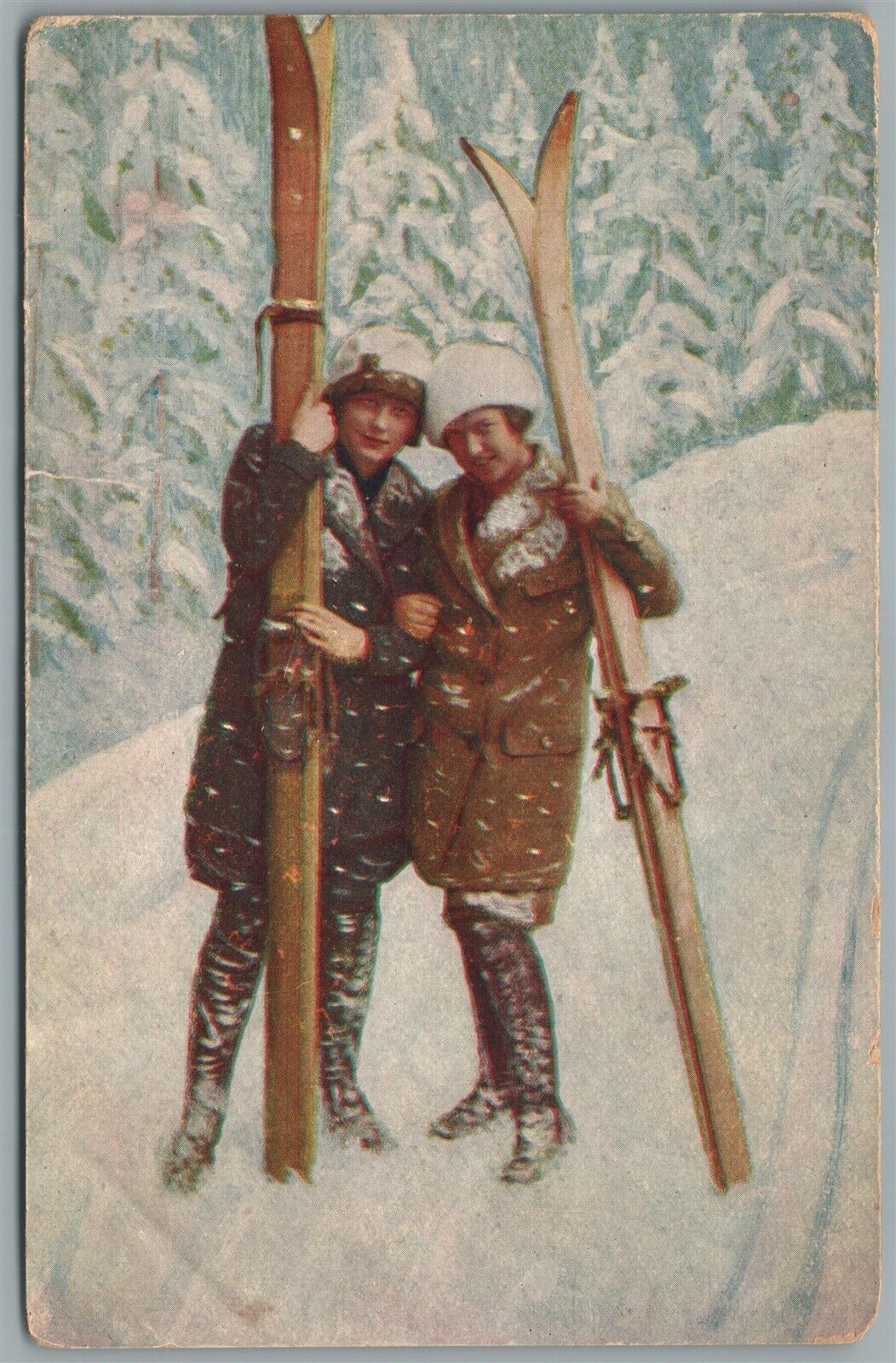 TWO FEMALE SKIERS ANTIQUE POSTCARD