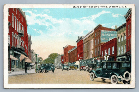 CARTHAGE NY STATE STREET LOOKING NORTH ANTIQUE POSTCARD w/ CARS