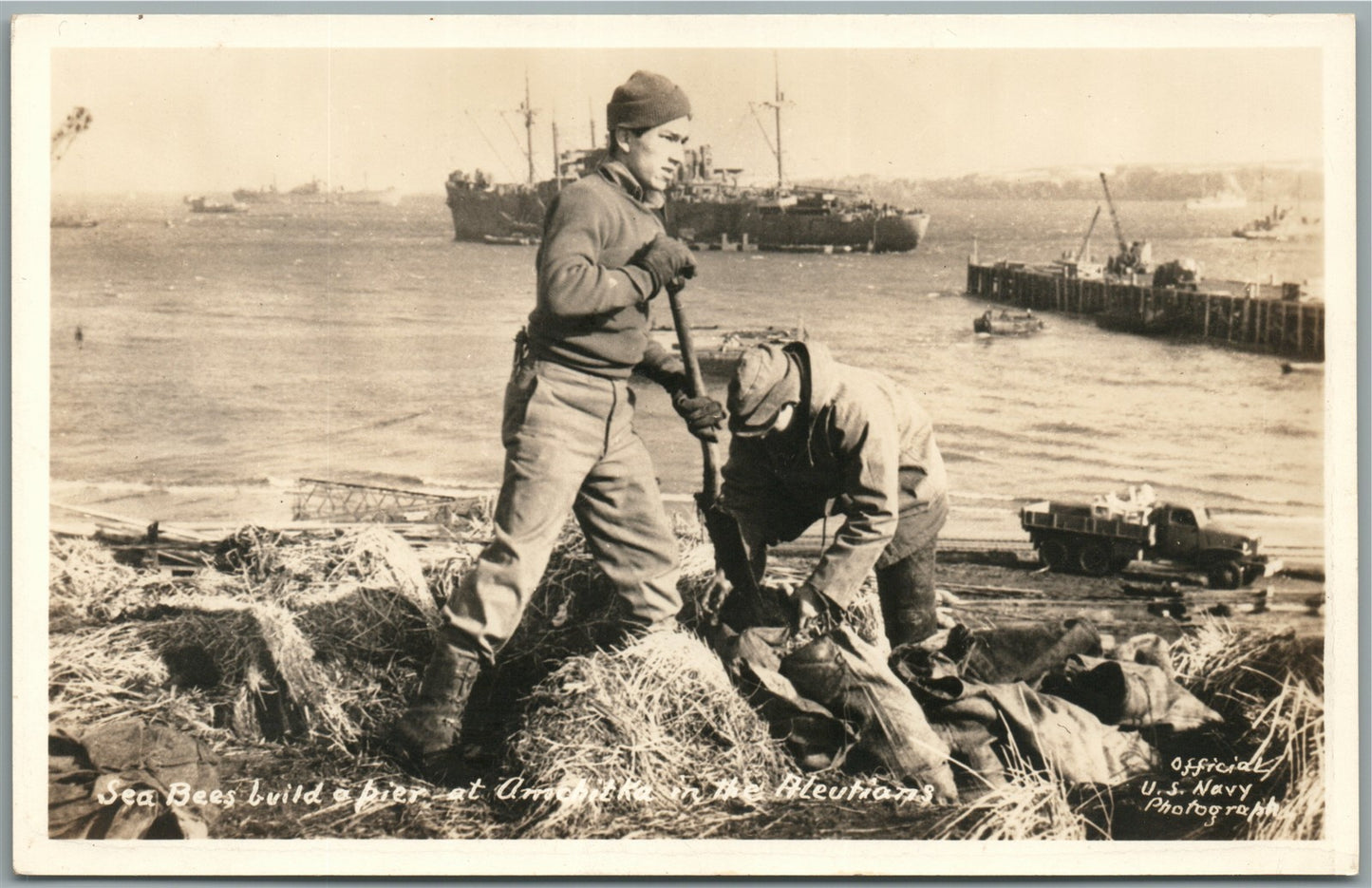 SEA BEES BUILD PIER AT AMCHITKA ANTIQUE REAL PHOTO POSTCARD RPPC